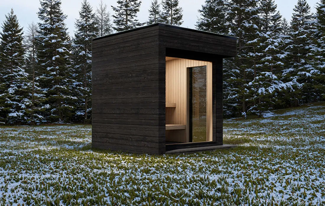 Premium outdoor sauna design captured from angled side view in a landscaped private garden